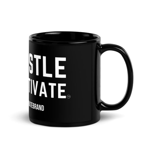 Hustle Motivate glossy black ceramic mug with white and teal artwork, 11 oz, handle on the right.