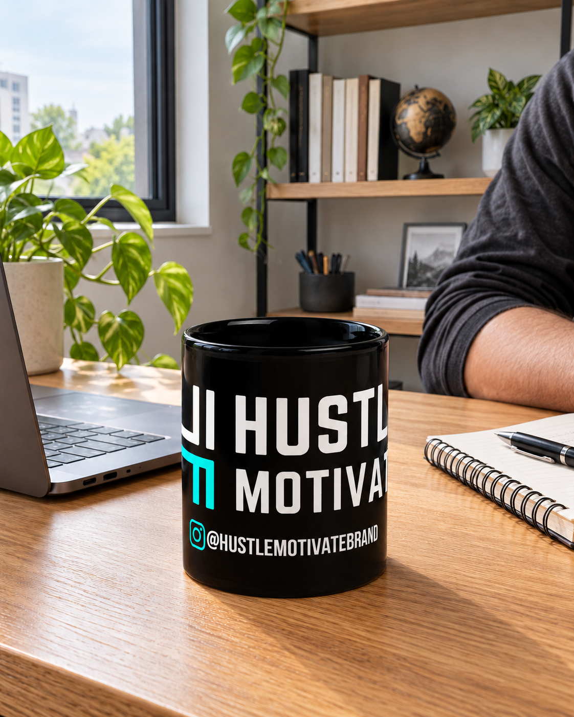 AI-generated lifestyle mockup of the Hustle Motivate black mug on a desk beside a laptop and notebook.